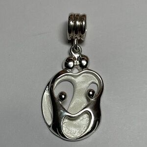 Carolyn Pollack Sterling Silver Family of Four Pendant. 1 3/8 inches long